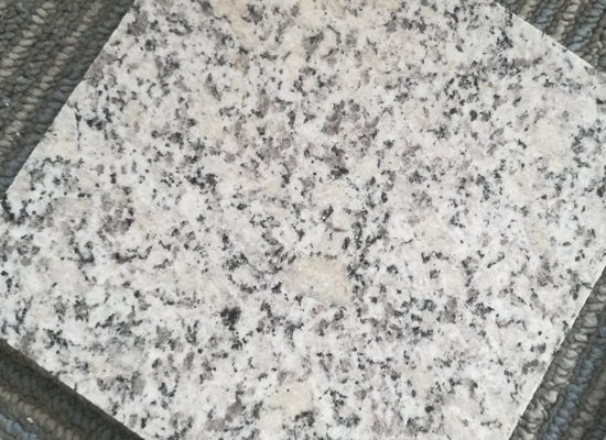 异型芝麻白石材.jpg